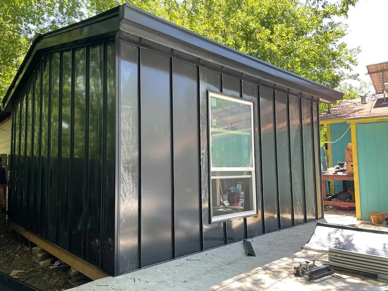 Black standing seam metal wall panels for Metal Roof Installation in Winston-Salem