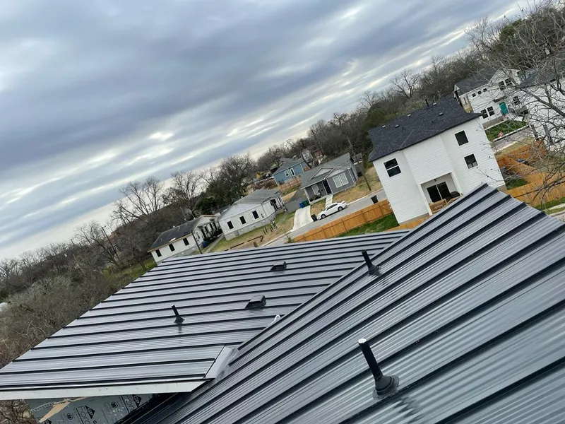 Standing seam metal roof panels with vents for Skylight Repair in Winston-Salem